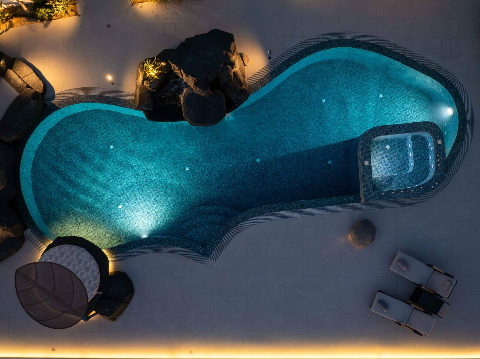 POOL IN THE NIGHT FROM ABOVE